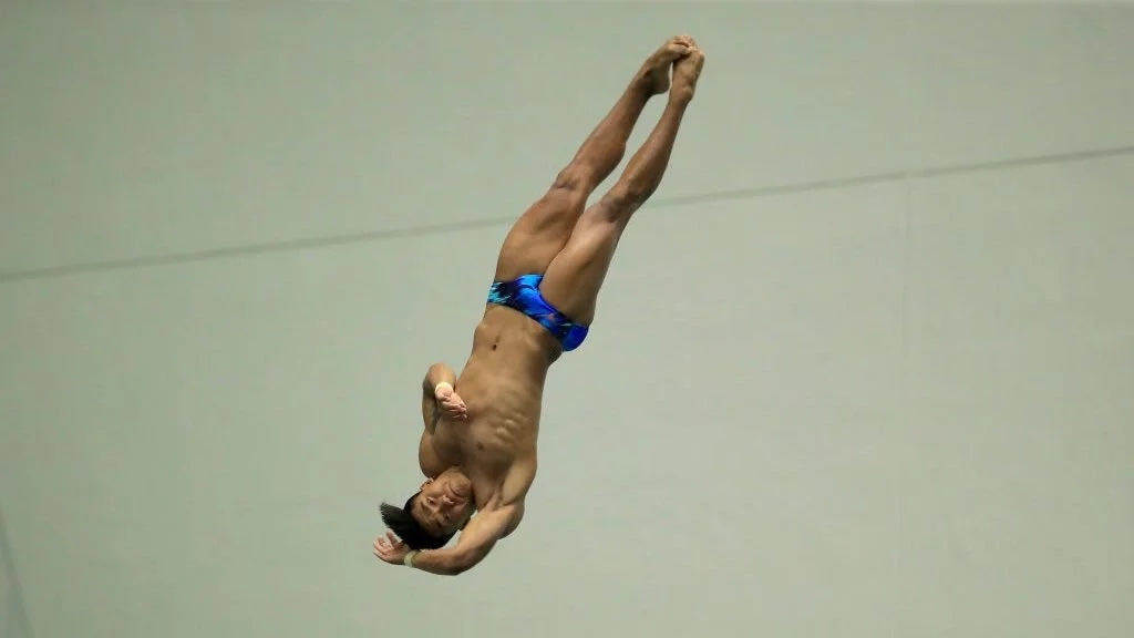 Adopted from Cambodian orphanage, diver Jordan Windle makes U.S. Olympic team on third try